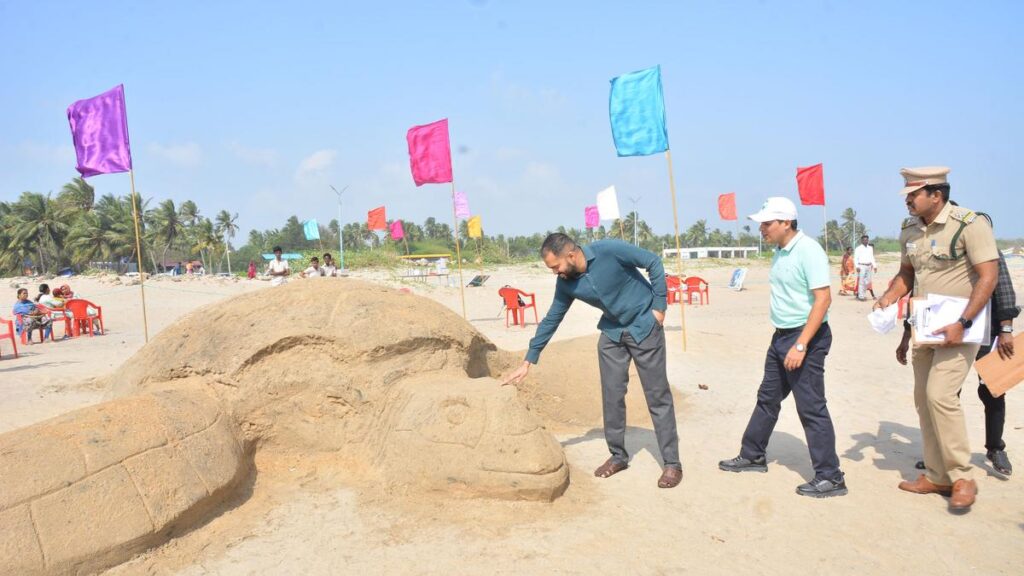 College students express their ideas to save sea turtle at sand art competition in Nagapattinam